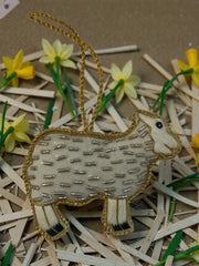 Guld får i perlebroderi